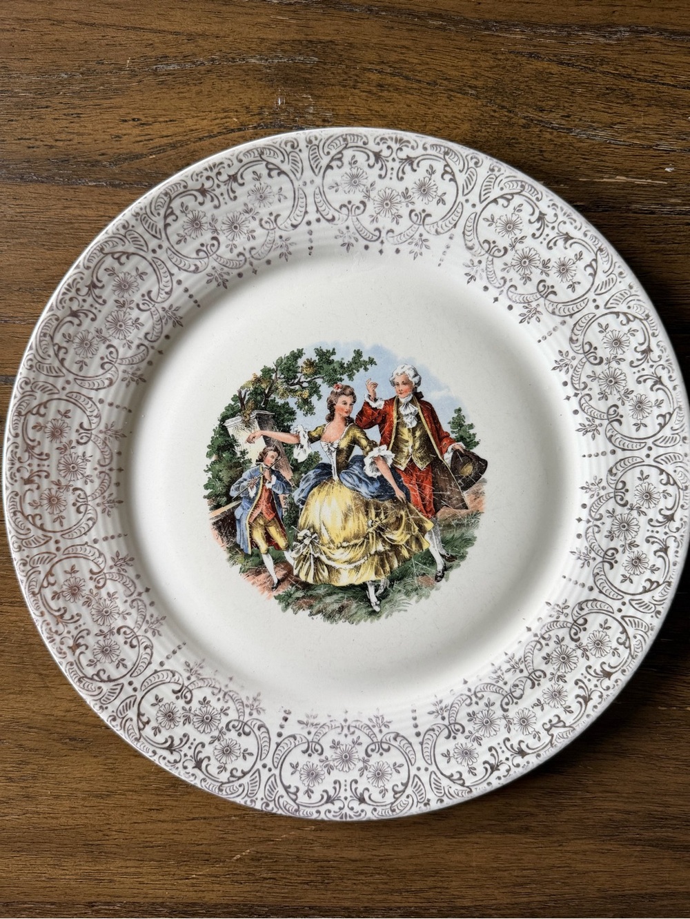 Ornate White Decorative Dinner Plate with Pastoral Couple Motif 22 K Gold
